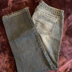 Distressed boot cut jeans